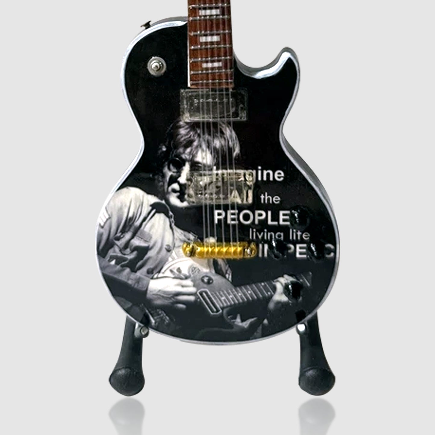 John Lennon Miniature 10” Guitar With Stand. Extremely Rare Item! Collectible