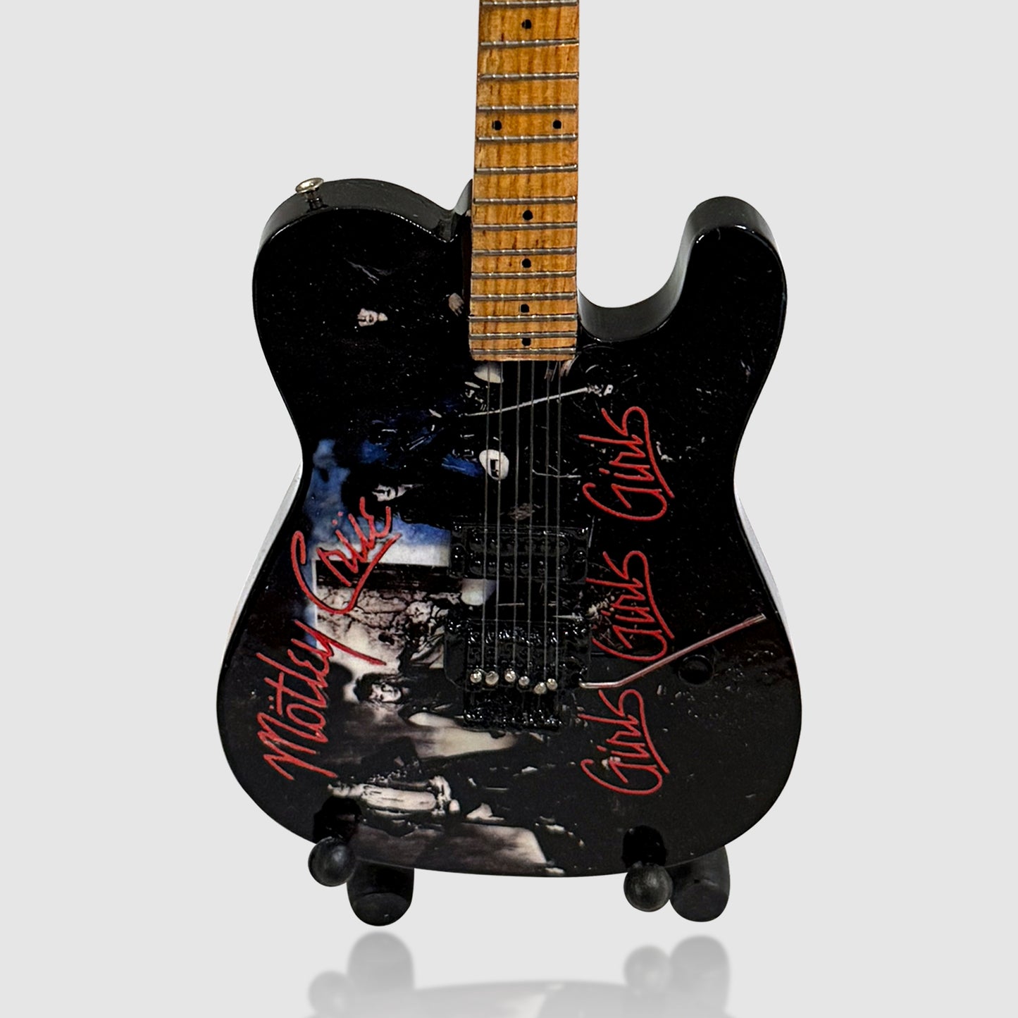 Motley Crue 10” Tribute Guitar With Stand. Girls, Girls, Girls